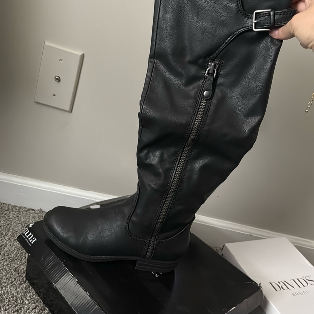 Tall black boots